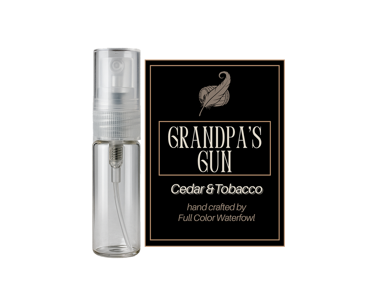 Clear spray bottle labeled 'Grandpa's Gun' with a black label featuring branding on a white background.