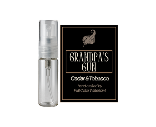 Clear spray bottle labeled 'Grandpa's Gun' with a black label featuring branding on a white background.